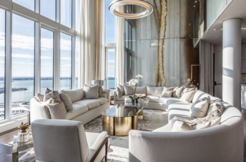 Sophisticated Miami-inspired luxury home in FL with modern art, plush seating, and high-end coastal interior design